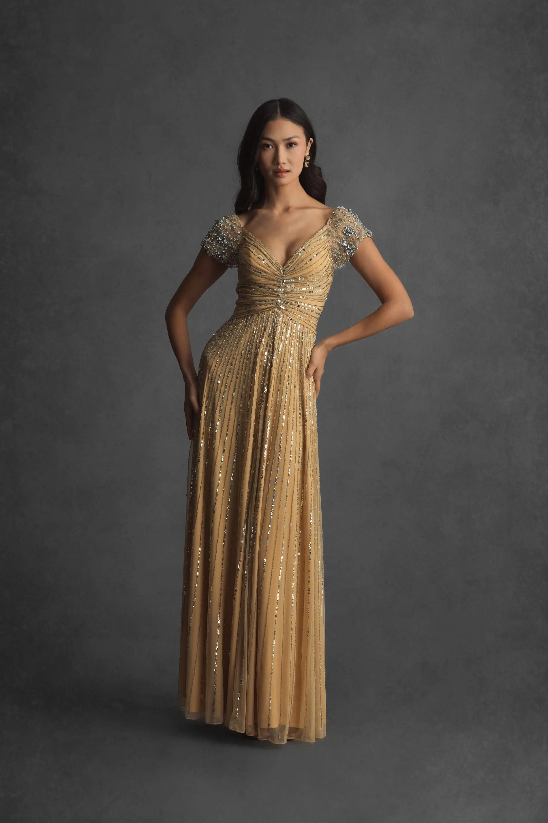 Gold Sequined Evening Gown With Embellished Shoulders