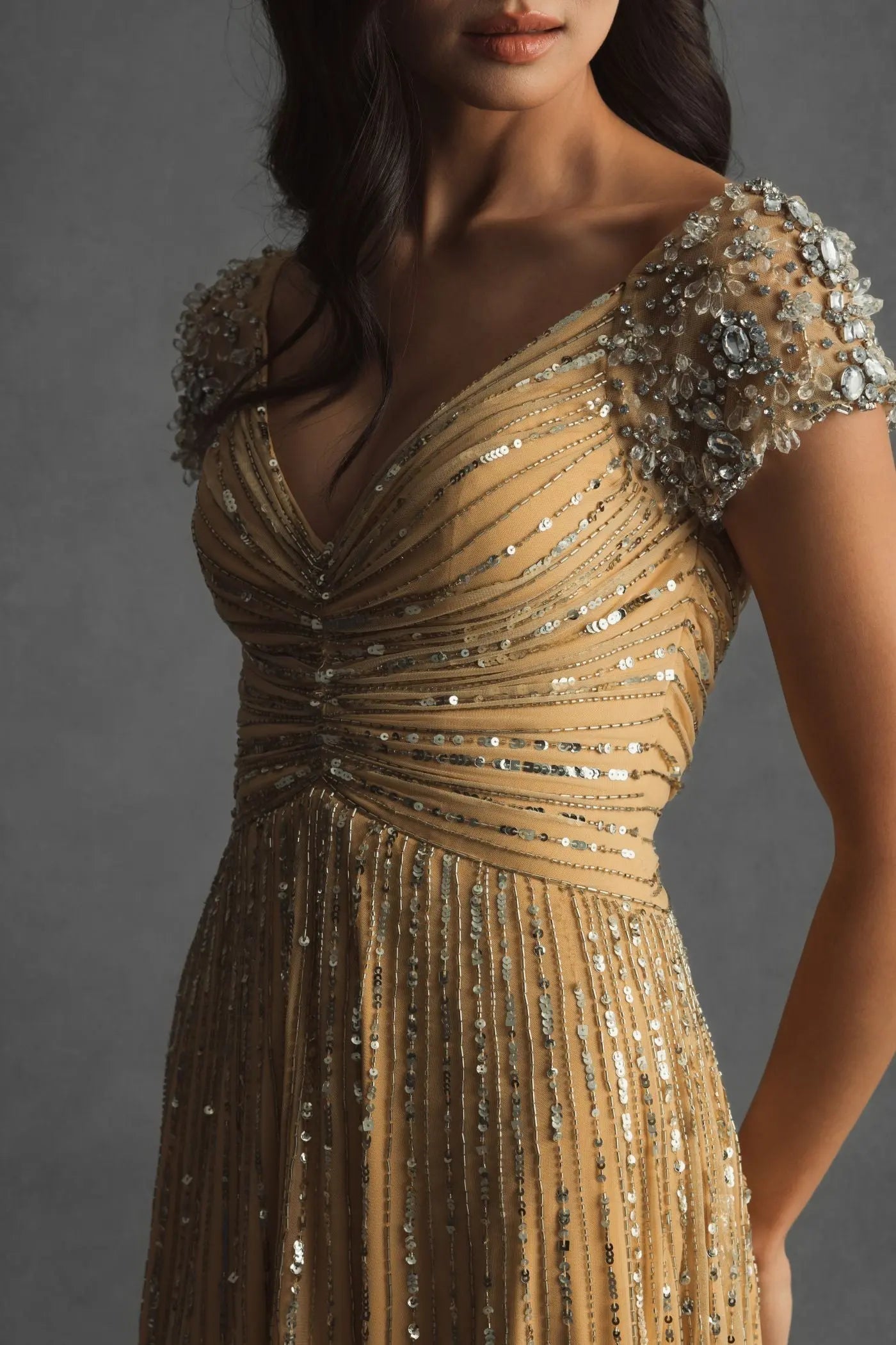 Gold Sequined Evening Gown With Embellished Shoulders
